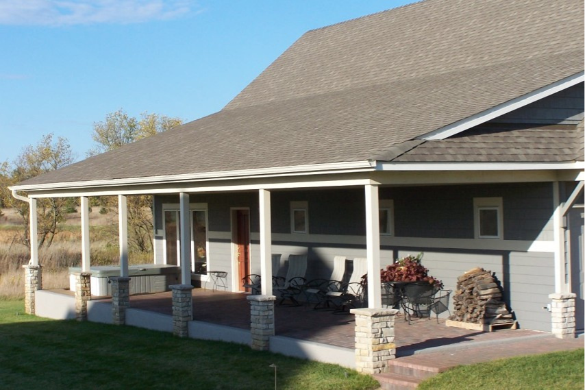 Garage remodel with updated doors, organized storage solutions, and durable flooring by Cardinal Remodeling.
