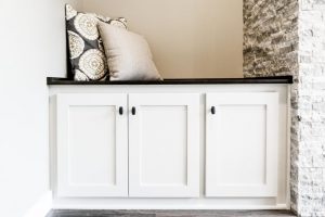 cabinets-next-to-fireplace-854×569